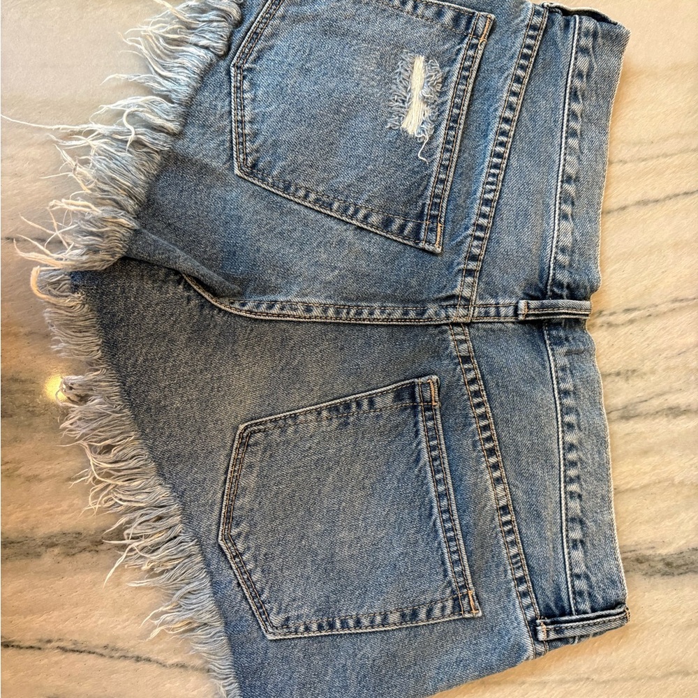 Free People Distressed Denim Shorts with Fringe - Picture 2 of 3